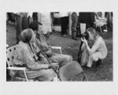 Indian Photographing Tourist Photographing Indians, Crow Fair, Montana by Zig Jackson