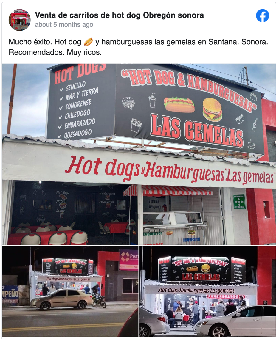 Un puesto de comida donde se venden hot dogs y hamburguesas.