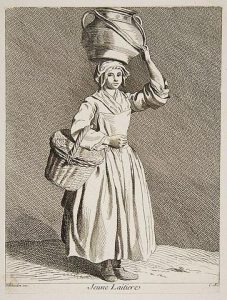 Milkmaid with large jug of milk on her head