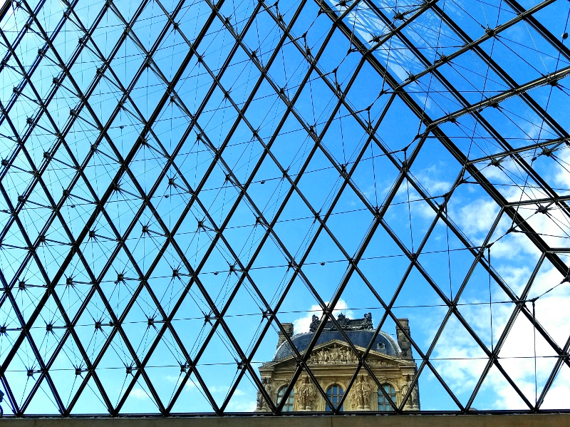 View of the Richelieu Wing of the Louvre palace from inside the modern Louvre Pyramid