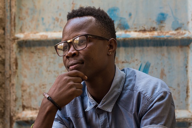 young black man wearing glasses