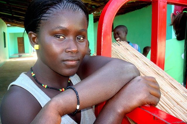 young black woman wearing beaded jewelry