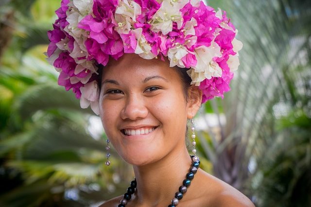 Young Polynesian woman in floral headdress