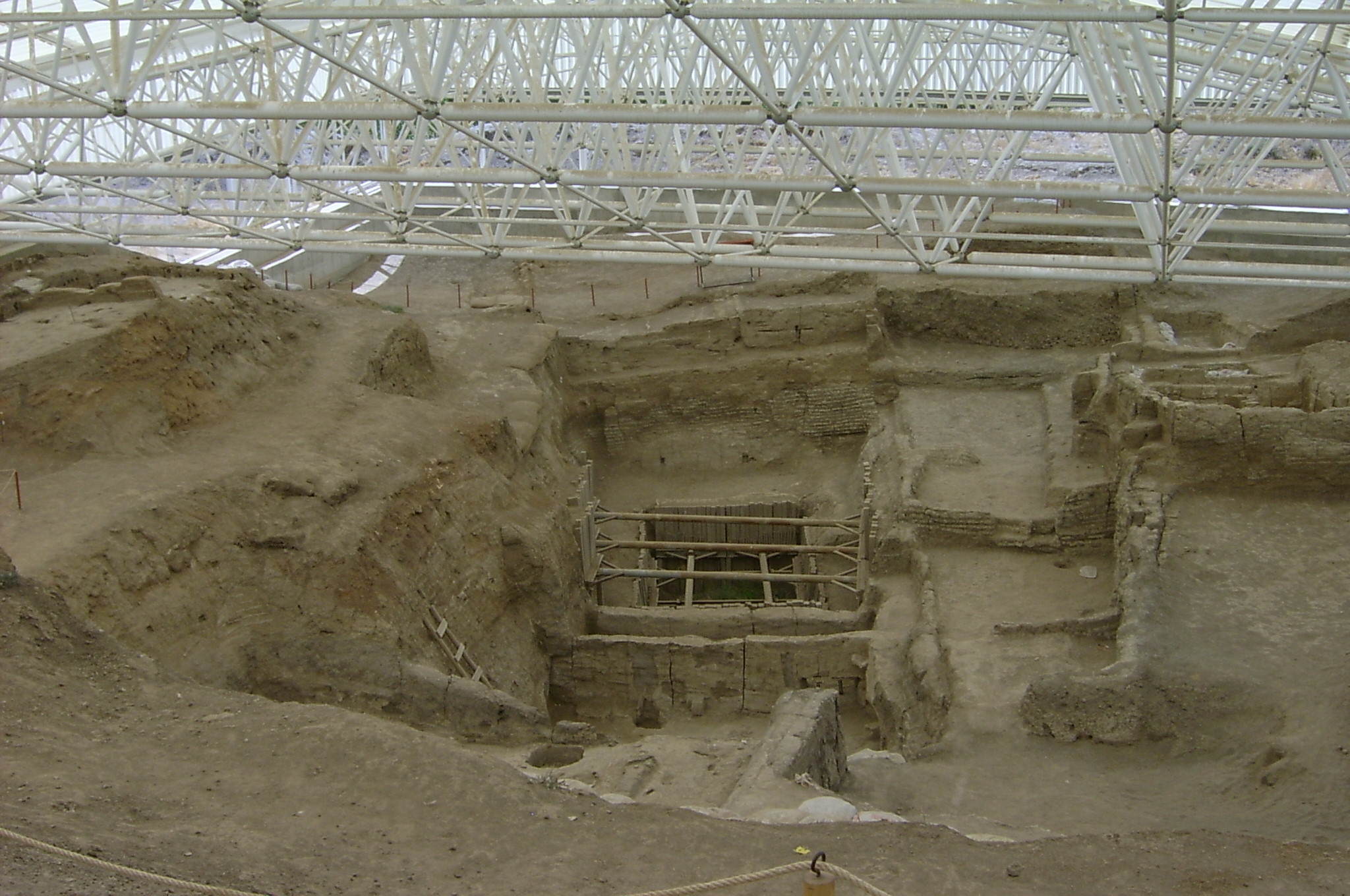 image of Çatal höyük archaeological excavation with standing stone brick architecture