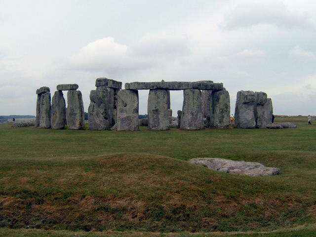 Image of Stonehenge. Archaeological site having several stones erected vertically with one stone placed horizontally on top of the other vertical stones